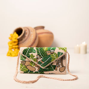 La foret handembriodered clutch