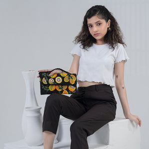 Lemon on black / handembriodered clutch