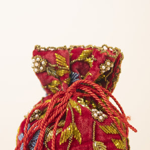 Hand embroidered potli bag red