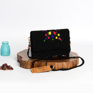 Black oasis/ hand embroidered clutch