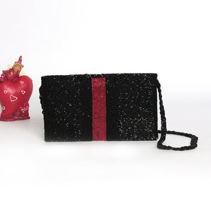 Caroline Bee / handembriodered clutch black