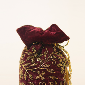 Hand embroidered potli bag maroon