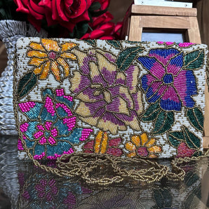 Caucasian white/ handembriodered clutch