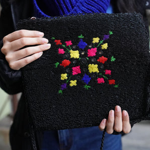 Nishaat seedbeads clutch